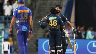 Gujarat Titans defeated Mumbai Indians by 3 wickets in a rain-affected match at the Wankhede Stadium in Mumbai. (REUTERS) Gujarat Titans defeated Mumbai Indians by 3 wickets in a rain-affected match at the Wankhede Stadium in Mumbai. (REUTERS)