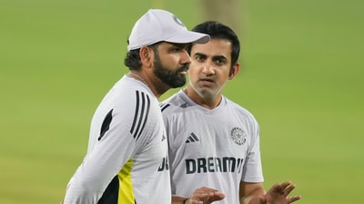 India's captain Rohit Sharma, left, speaks to head coach Gautam Gambhir during a training session (AP) India's captain Rohit Sharma, left, speaks to head coach Gautam Gambhir during a training session (AP)