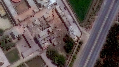 This satellite image provided by Maxar Technologies shows airstrikes damage at Jamia Masjid Subhan Allah mosque in Pakistan. (AP)