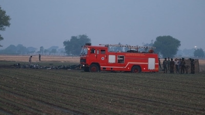 At least one person was killed and nine others sustained injuries after an unidentified aircraft crashed and went up in flames in Aklian Kalan village of Punjab’s Bathinda district. (Ravi Kumar/HT)