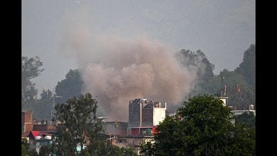 Smoke billows after an artillery shell landed in the main town of Poonch district in India's Jammu region on May 7, 2025. At least eight Indians were killed and 29 others wounded Wednesday in the town of Poonch in Kashmir, close to the de facto border with Pakistan, a local Indian government official said. (Photo by Punit PARANJPE / AFP) (AFP) Smoke billows after an artillery shell landed in the main town of Poonch district in India's Jammu region on May 7, 2025. At least eight Indians were killed and 29 others wounded Wednesday in the town of Poonch in Kashmir, close to the de facto border with Pakistan, a local Indian government official said. (Photo by Punit PARANJPE / AFP) (AFP)