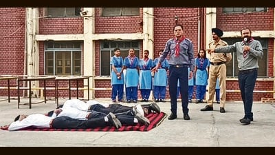 Students during mock drill at Government Senior Secondary (Multipurpose) School in Ludhiana on Wednesday (HT Photo) Students during mock drill at Government Senior Secondary (Multipurpose) School in Ludhiana on Wednesday (HT Photo)
