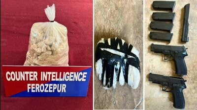 Teams arrested Sandeep Singh and Judge Singh with 465 grams of heroin, two pistols with magazines, and a pistol slide near the Government College, Mohkam Wala, in village Kotwal. (HT Photo)