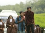 Kannan Sagar and Dulquer Salmaan in a still from the Malayalam film Charlie (2015). 