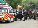 Security personnel cordon off a street near a site after a drone attack on Lahore on May 8, 2025.