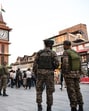 Security personnel stand guard at Lal Chowk, in Srinagar on Wednesday. (ANI)