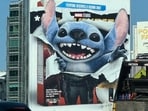 The latest update to the Thunderbolts billboard sees Stitch tearing through it. The latest update to the Thunderbolts billboard sees Stitch tearing through it.