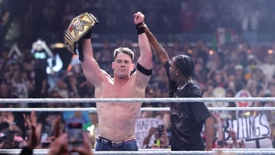 LAS VEGAS, NEVADA - APRIL 20: John Cena (L) celebrates with rapper Travis Scott after defeating Cody Rhodes for the Undisputed WWE Championship during WrestleMania 41 at Allegiant Stadium on April 20, 2025 in Las Vegas, Nevada. Ethan Miller/Getty Images/AFP (Photo by Ethan Miller / GETTY IMAGES NORTH AMERICA / Getty Images via AFP) (Getty Images via AFP) LAS VEGAS, NEVADA - APRIL 20: John Cena (L) celebrates with rapper Travis Scott after defeating Cody Rhodes for the Undisputed WWE Championship during WrestleMania 41 at Allegiant Stadium on April 20, 2025 in Las Vegas, Nevada. Ethan Miller/Getty Images/AFP (Photo by Ethan Miller / GETTY IMAGES NORTH AMERICA / Getty Images via AFP) (Getty Images via AFP)