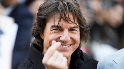 Tom Cruise poses for the photographers upon his arrival to promote his latest movie "Mission: Impossible - The Final Reckoning," at the Gimpo Airport in Seoul, South Korea, Wednesday, May 7, 2025. AP/PTI (AP) Tom Cruise poses for the photographers upon his arrival to promote his latest movie "Mission: Impossible - The Final Reckoning," at the Gimpo Airport in Seoul, South Korea, Wednesday, May 7, 2025. AP/PTI (AP)