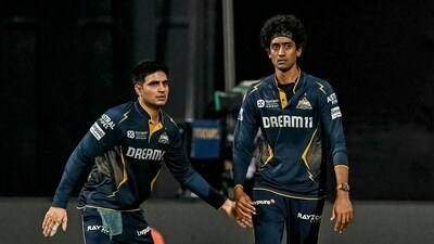 Gujarat Titans' Sai Kishore (R) celebrates with captain Shubman Gill (AFP) Gujarat Titans' Sai Kishore (R) celebrates with captain Shubman Gill (AFP)