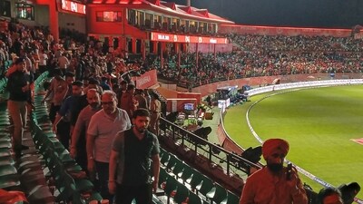 Spectators leave after the DC vs PBKS match is called off. (AFP) Spectators leave after the DC vs PBKS match is called off. (AFP)