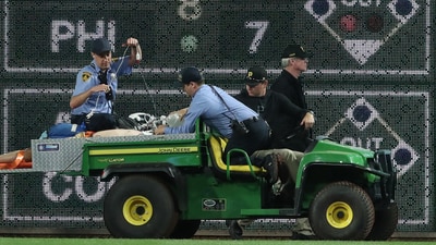 Stadium security and Pittsburgh Pirates medical personnel cart Kavan Markwood, who fell from the stands to the field to an ambulance (IMAGN IMAGES via Reuters Connect)