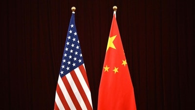 This photo shows a gerenal view of China's and USA's flags during a meeting between US Treasury Secretary Janet Yellen and China's Vice Premier He Lifeng at the Guangdong Zhudao Guest House in the southern Chinese city of Guangzhou. (AFP) This photo shows a gerenal view of China's and USA's flags during a meeting between US Treasury Secretary Janet Yellen and China's Vice Premier He Lifeng at the Guangdong Zhudao Guest House in the southern Chinese city of Guangzhou. (AFP)