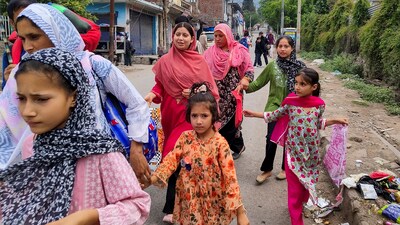 People move to a safer place as part of an evacuation amid shelling from Pakistan, after the Indian Army's 'Operation Sindoor', in Poonch district, on Wednesday. (PTI)