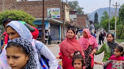 People move to a safer place as part of an evacuation amid shelling from Pakistan, after the Indian Army's 'Operation Sindoor', in Poonch district, on Wednesday. (PTI) People move to a safer place as part of an evacuation amid shelling from Pakistan, after the Indian Army's 'Operation Sindoor', in Poonch district, on Wednesday. (PTI)