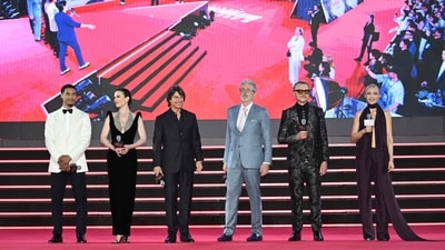 US actor Greg Tarzan Davis, British-US actress Hayley Atwell, US actor Tom Cruise, US film director Christopher McQuarrie, British actor Simon Pegg, and French actress Pom Klementieff attend a red carpet event. Cruise had earlier hinted at the thrilling action fans can expect in The Final Reckoning, which features an underwater submarine sequence and a scene where he dangles from a plane. (AFP) US actor Greg Tarzan Davis, British-US actress Hayley Atwell, US actor Tom Cruise, US film director Christopher McQuarrie, British actor Simon Pegg, and French actress Pom Klementieff attend a red carpet event. Cruise had earlier hinted at the thrilling action fans can expect in The Final Reckoning, which features an underwater submarine sequence and a scene where he dangles from a plane. (AFP)