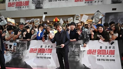 Tom Cruise poses for a photo with his fans. Directed by Christopher McQuarrie, the film's screenplay is co-written by McQuarrie and Erik Jendresen. (AFP) Tom Cruise poses for a photo with his fans. Directed by Christopher McQuarrie, the film's screenplay is co-written by McQuarrie and Erik Jendresen. (AFP)