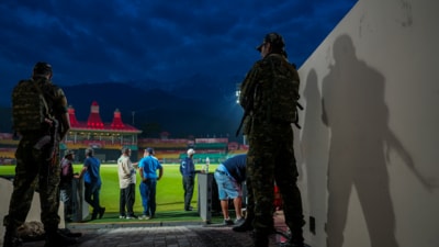 Security personnel stand guard a the HPCA Stadium in Dharamsala (PTI) Security personnel stand guard a the HPCA Stadium in Dharamsala (PTI)