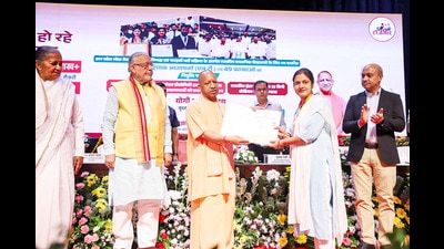 UP CM Yogi Adityanath attends a programme organised in Lucknow for distribution of appointment letters to 494 newly selected Assistant Teachers (LT) and 49 Lecturers for Government Secondary Schools by UPPSC. (PTI) UP CM Yogi Adityanath attends a programme organised in Lucknow for distribution of appointment letters to 494 newly selected Assistant Teachers (LT) and 49 Lecturers for Government Secondary Schools by UPPSC. (PTI)