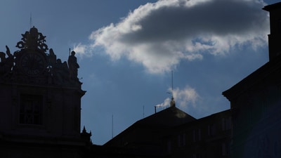 White smoke billows from the chimney of the Sistine Chapel where 133 cardinals are gathering on the second day of the conclave to elect a successor to late Pope Francis, at the Vatican, Thursday, May 8, 2025 (AP Photo/Bernat Armangue) (AP) White smoke billows from the chimney of the Sistine Chapel where 133 cardinals are gathering on the second day of the conclave to elect a successor to late Pope Francis, at the Vatican, Thursday, May 8, 2025 (AP Photo/Bernat Armangue) (AP)