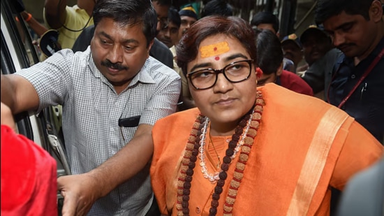 Former BJP parliamentarian Sadhvi Pragya Singh Thakur, an accused in the case, leaving the special court in 2018. (PTI/File)
