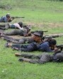 (FILES) In this file photo taken on July 8, 2012 Indian Maoists ready their weapons as they take part in a training camp in Bijapur district in Chhattisgarh. Police said April 24, 2018 that dozens of Maoist guerrillas had been killed in jungle raids in India's remote interior by commandos fighting the country's longest-running conflict. / AFP PHOTO / Noah SEELAM (AFP) (FILES) In this file photo taken on July 8, 2012 Indian Maoists ready their weapons as they take part in a training camp in Bijapur district in Chhattisgarh. Police said April 24, 2018 that dozens of Maoist guerrillas had been killed in jungle raids in India's remote interior by commandos fighting the country's longest-running conflict. / AFP PHOTO / Noah SEELAM (AFP)