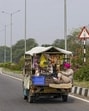 A tempo plying on the Attari-Wagah road amid rise in tension between India and Pakistan, in Amritsar district on Friday. A complete blackout was enforced in the border districts on Thursday night and power supply was restored at 5.30am on Friday. (PTI Photo)
