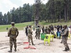 Security personnel inspect the site following the Pahalgam terrorist attack that took place on Apr 22, leaving several people dead and many injured, at Baisaran in Pahalgam. Security personnel inspect the site following the Pahalgam terrorist attack that took place on Apr 22, leaving several people dead and many injured, at Baisaran in Pahalgam.