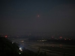 India's air defence system intercepts objects in the sky during a blackout following multiple blasts in the city of Jammu.