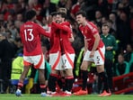 Manchester United's Mason Mount celebrates scoring their fourth goal with Patrick Dorgu and teammates