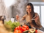 Cooking at home enables you to prepare a variety of nutrient-dense foods, and fit women know that, according to a yoga coach. (Representative picture: Freepik) Cooking at home enables you to prepare a variety of nutrient-dense foods, and fit women know that, according to a yoga coach. (Representative picture: Freepik)