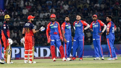 Royal Challengers Bengaluru's Virat Kohli interacts with Delhi Capitals players (ANI) Royal Challengers Bengaluru's Virat Kohli interacts with Delhi Capitals players (ANI)