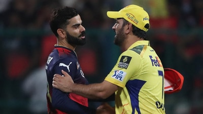 Royal Challengers Bengaluru' Virat Kohli shakes hands with Chennai Super Kings' MS Dhoni (REUTERS)
