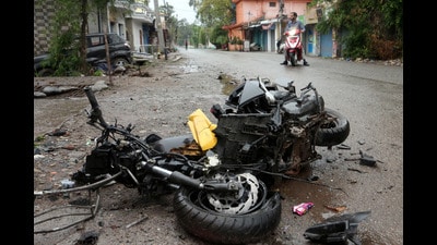 Debris of a scooter damaged by a cross-border shelling lies on a road in Poonch on Thursday. (REUTERS) Debris of a scooter damaged by a cross-border shelling lies on a road in Poonch on Thursday. (REUTERS)