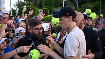 Italy's Jannik Sinner signs autographs after a training session ahead of the ATP Rome Open in Rome. (AFP) Italy's Jannik Sinner signs autographs after a training session ahead of the ATP Rome Open in Rome. (AFP)