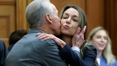 William Read kisses his daughter, Karen, before the start of her murder trial in Norfolk Superior Court in Dedham (AP) William Read kisses his daughter, Karen, before the start of her murder trial in Norfolk Superior Court in Dedham (AP)