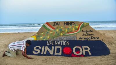 Odia sand artist Sudarsan Pattnaik creates a sand sculpture celebrating the Indian armed forces' missile strikes on terror targets in Pakistan and PoK, at Puri beach in Odisha. (PTI Photo) Odia sand artist Sudarsan Pattnaik creates a sand sculpture celebrating the Indian armed forces' missile strikes on terror targets in Pakistan and PoK, at Puri beach in Odisha. (PTI Photo)