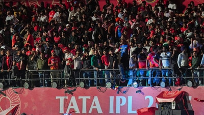 Spectators leave after the Indian Premier League (IPL) 2025 T20 cricket match between Punjab Kings and Delhi Capitals was suspended in Dharamsala, (PTI) Spectators leave after the Indian Premier League (IPL) 2025 T20 cricket match between Punjab Kings and Delhi Capitals was suspended in Dharamsala, (PTI)