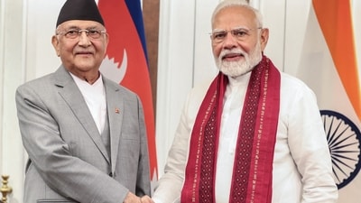 Prime Minister Narendra Modi (R) shaking hands with his Nepal's counterpart KP Sharma Oli (AFP) Prime Minister Narendra Modi (R) shaking hands with his Nepal's counterpart KP Sharma Oli (AFP)