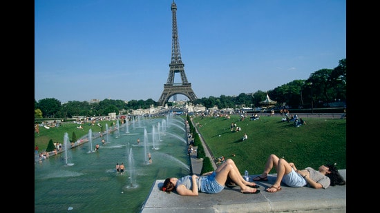 Paris has a network of cool islands – pools, fountains and parks - mapped on the government’s heat app. When temperature breach dangerous levels, the app pings with alerts and can guide the user to the nearest such spot. (Getty Images)