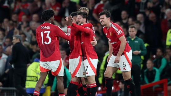 Manchester United's Mason Mount celebrates scoring their fourth goal with Patrick Dorgu and teammates(REUTERS)