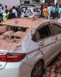 Damaged vehicles are pictured following Pakistani artillery shelling in Jammu, Jammu and Kashmir, India on Saturday. (AFP) Damaged vehicles are pictured following Pakistani artillery shelling in Jammu, Jammu and Kashmir, India on Saturday. (AFP)