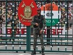 A Pakistani Ranger stands guard during the 'Beating Retreat' ceremony at the border gates of Pakistan and India at the Wagah border post.