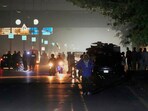 Pakistani police officers remove vehicles and people from the main entry of Nur Khan airbase following an Indian missile strike in Rawalpindi, Pakistan, on Saturday Pakistani police officers remove vehicles and people from the main entry of Nur Khan airbase following an Indian missile strike in Rawalpindi, Pakistan, on Saturday