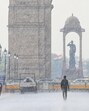 People caught in the rain at Kartavya Path in Delhi on Saturday. (Vipin Kumar/HT Photo) People caught in the rain at Kartavya Path in Delhi on Saturday. (Vipin Kumar/HT Photo)