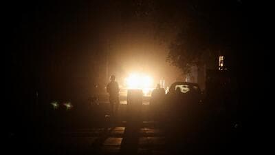 A man walks on a street during a blackout in the city of Amritsar on Saturday. (REUTERS) A man walks on a street during a blackout in the city of Amritsar on Saturday. (REUTERS)
