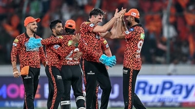Sunrisers Hyderabad's captain Pat Cummins (2R) celebrates with teammates (AFP)