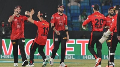 Lahore Qalandars' New Zealand all rounder Daryl Mitchell (L) with teammates (AFP) Lahore Qalandars' New Zealand all rounder Daryl Mitchell (L) with teammates (AFP)