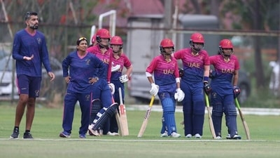 UAE batters wait on the boundary line to sprint on to pitch and retire out as the team tries to gain extra time ahead of a rain delay in a T20 Women's World Cup Asia Region qualifier. (ICC) UAE batters wait on the boundary line to sprint on to pitch and retire out as the team tries to gain extra time ahead of a rain delay in a T20 Women's World Cup Asia Region qualifier. (ICC)