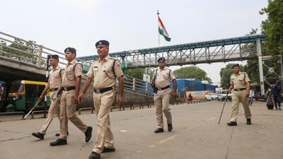 Railway Protection Force (RPF) personnel during a route march at the Ahmedabad Railway Station, amid tight security in the wake of the ongoing India-Pakistan military conflict, on Friday. (PTI) Railway Protection Force (RPF) personnel during a route march at the Ahmedabad Railway Station, amid tight security in the wake of the ongoing India-Pakistan military conflict, on Friday. (PTI)
